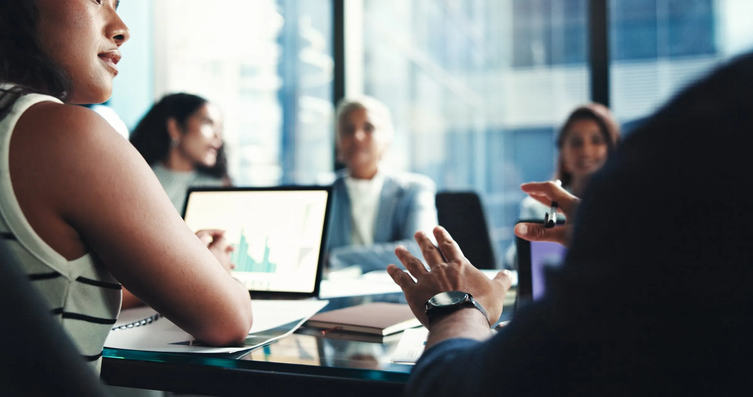 Practitioners collaborating in a meeting